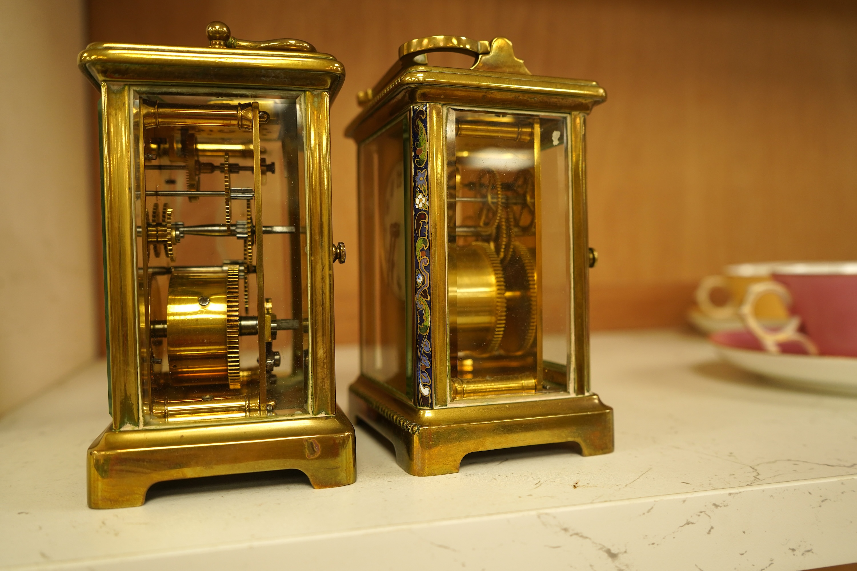 A lacquered brass champleve enamel carriage timepiece and one other, no keys, largest 15cm high